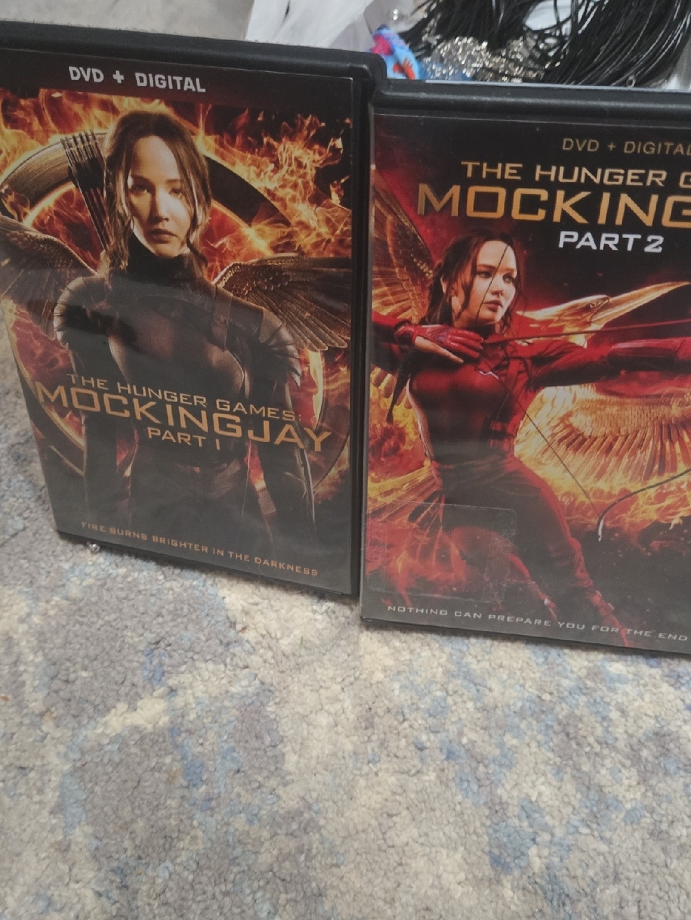 The Hunger Games: Mockingjay Part 1 AND Part 2 DVD + Digital  Orange/Black Cover